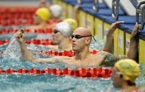 DELHI, INDIA - OCTOBER 09: Brent Hayden of Canada celebrates after winning the gold medal in the Men's 50m Freestyle at Dr. S.P. Mukherjee Aquatics Complex during day six of the Delhi 2010 Commonwealth Games on October 9, 2010 in Delhi, India. (Photo by Matt King/Getty Images)