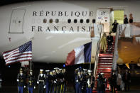 French President Emmanuel Macron with his wife Brigitte Macron arrive at Andrews Air Force Base, Md., on Tuesday, Nov. 29, 2022, for an official state visit. (AP Photo/Manuel Balce Ceneta)