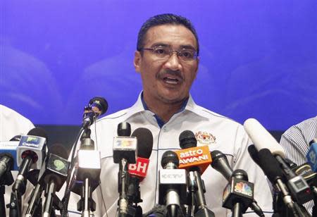 Malaysia's Transport and Defence Minister Hishamuddin Hussein speaks at a news conference at a hotel near Kuala Lumpur International Airport in Sepang March 9, 2014. REUTERS/Edgar Su