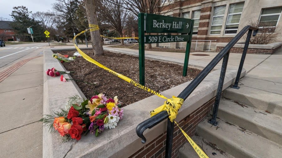 Flowers placed outside Berkey Hall after a shooting on MSU's campus killed three students and injured five others. (Feb. 14, 2023)