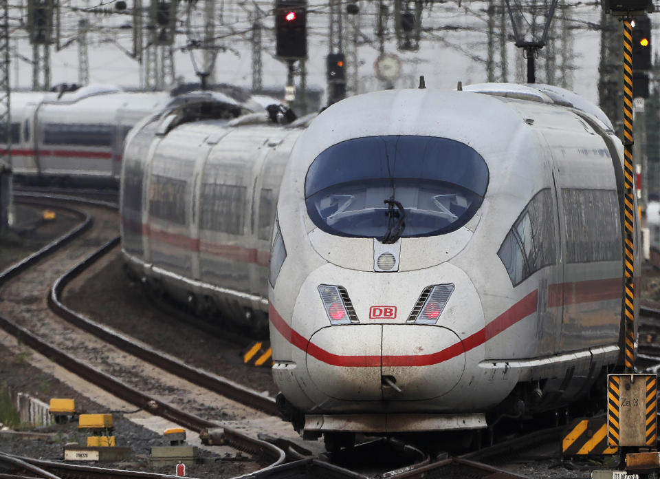 An ICE train approaches the main train station in Frankfurt, Germany, Wednesday, June 19, 2019. (AP Photo/Michael Sohn)