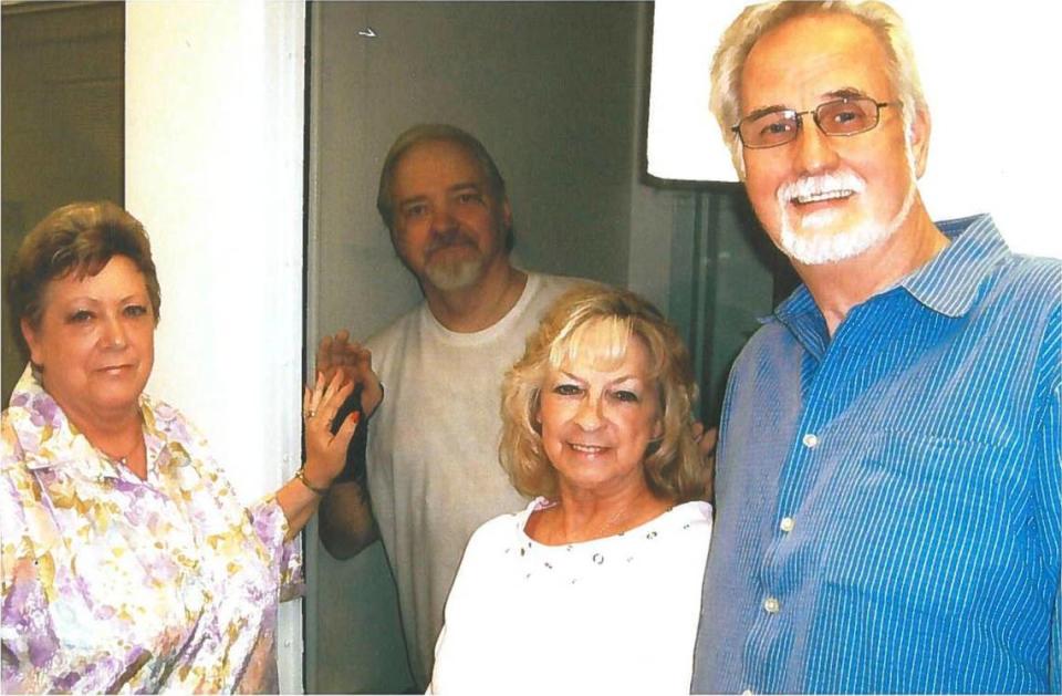 Death row prisoner Thomas Creech, center left, awaits a clemency hearing before the Idaho Commission of Pardons and Parole on Jan. 19, 2024. He is pictured here with (from left to right) his wife, LeAnn Creech, his older sister, Virginia Plageman, and his sister’s late husband, Michael Plagemen, in the visiting area at the Idaho Maximum Security Institution in Kuna in 1999.