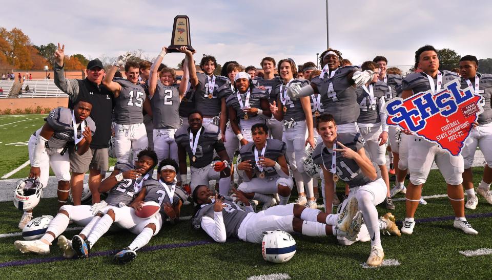 The Southside Christian Sabres take on the Bamberg-Ehrhardt Red Raiders in the SCHSL 1A State Championship football game, held at Benedict College in Columbia, Saturday evening, December 4, 2021. Southside Christian celebrates their state championship win after the game Saturday.