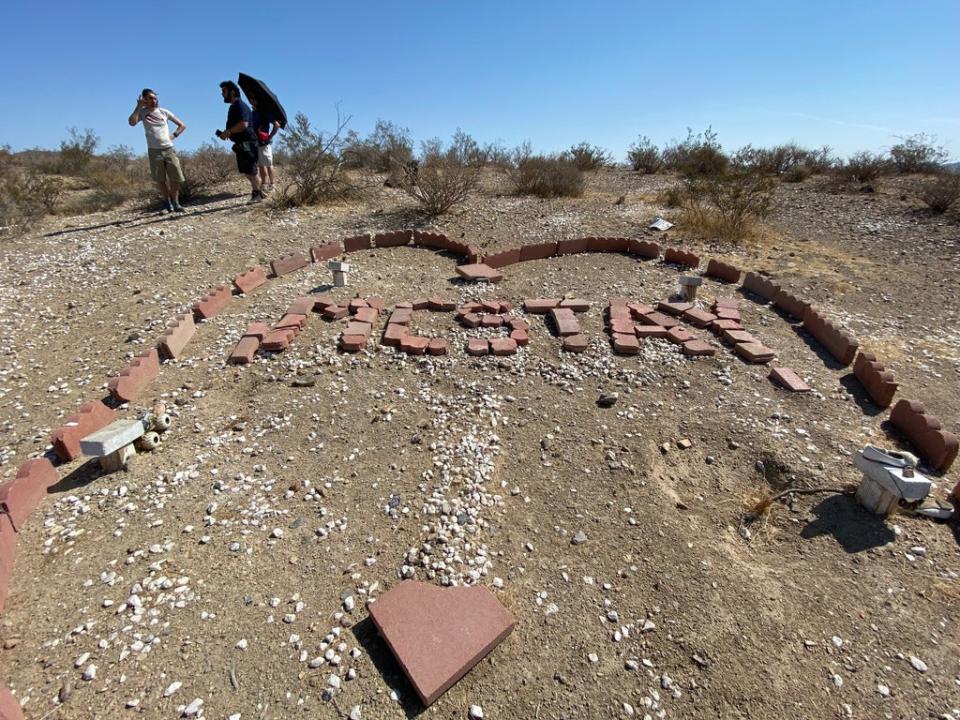 A memorial adorns at the gravesites where the McStays were found nearly four years after they mysteriously vanished (Red Marble Media/Investigation Discovery)