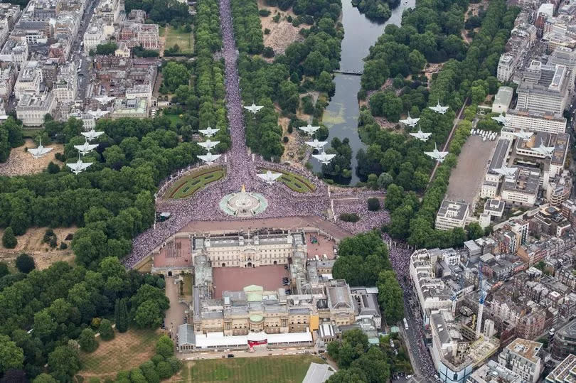 RAF Typhoon aircraft fly in formation for the RAF100 flypast over Buckingham Palace