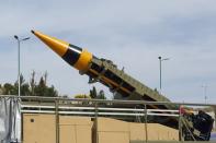 Iran unveils 2,000 km ballistic missile