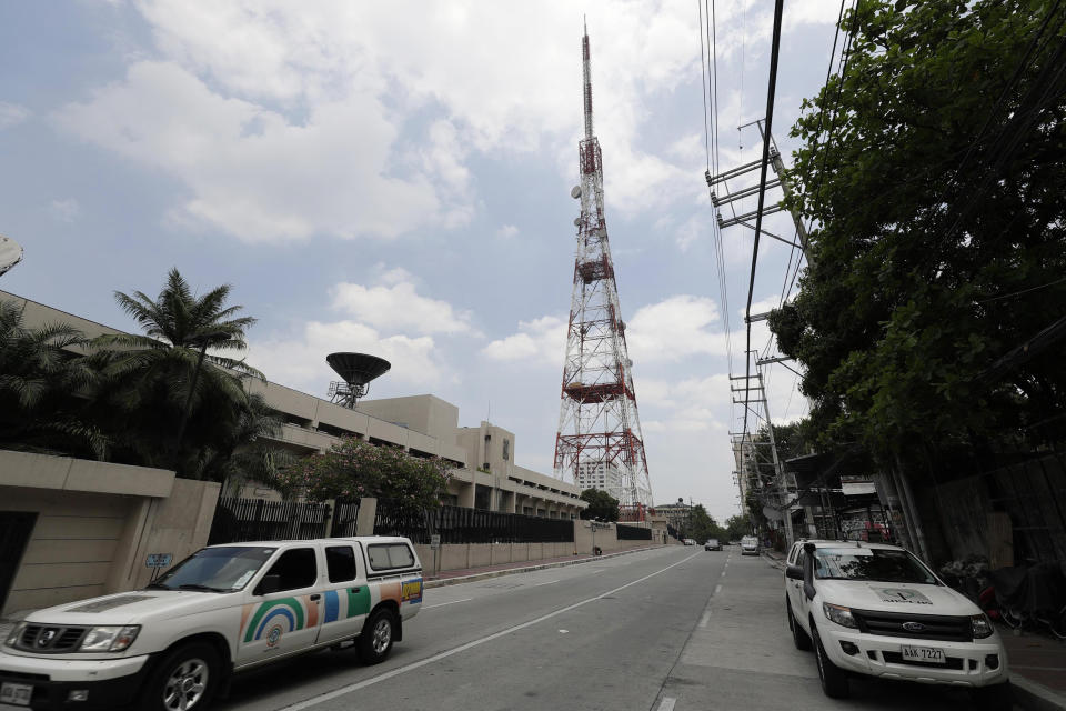 Corporate vehicles pass by the headquarters of broadcast network ABS-CBN Corp. on Wednesday May 6, 2020 in Manila, Philippines. Philippine church and business leaders expressed alarm Wednesday over a government agency’s shutdown of the country’s largest TV and radio network, which has been a major provider of news on the coronavirus pandemic. (AP Photo/Aaron Favila)