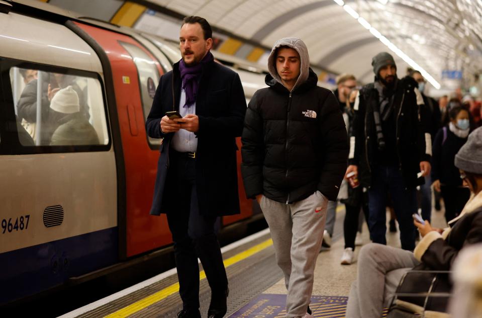 Passengers walk along the Jubilee line platform at Green Park (AFP via Getty Images)