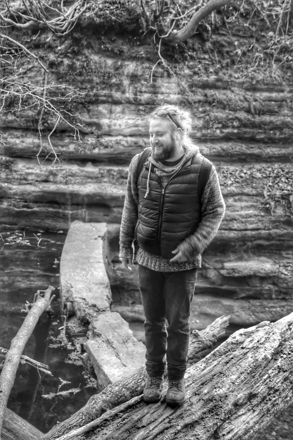 In this photo provided by Russ Boxer, Kevin Clark stands in Matthiessen State Park near Oglesby, Ill., in November 2020. Clark, who played drummer Freddy “Spazzy McGee” Jones in the 2003 movie “School of Rock” with Jack Black, was killed when he was struck by a car while riding his bicycle along a Chicago street early Wednesday, May 26. (Russ Boxer via AP)