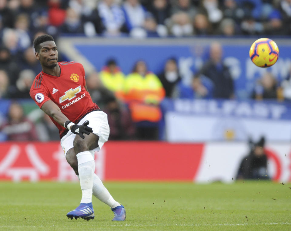 Manchester United's Paul Pogba kicks the ball during the English Premier League soccer match between Leicester City and Manchester United at the King Power Stadium in Leicester, England, Sunday, Feb 3, 2019. (AP Photo/Rui Vieira)