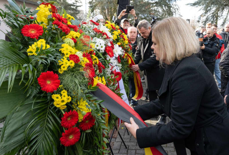 German Minister of the Interior Nancy Faeser lays a wreath at a memorial service for the victims of the racist attack in Hanau. On February 19, 2020, a racist shot nine people before also killing his mother and himself. Boris Roessler/dpa