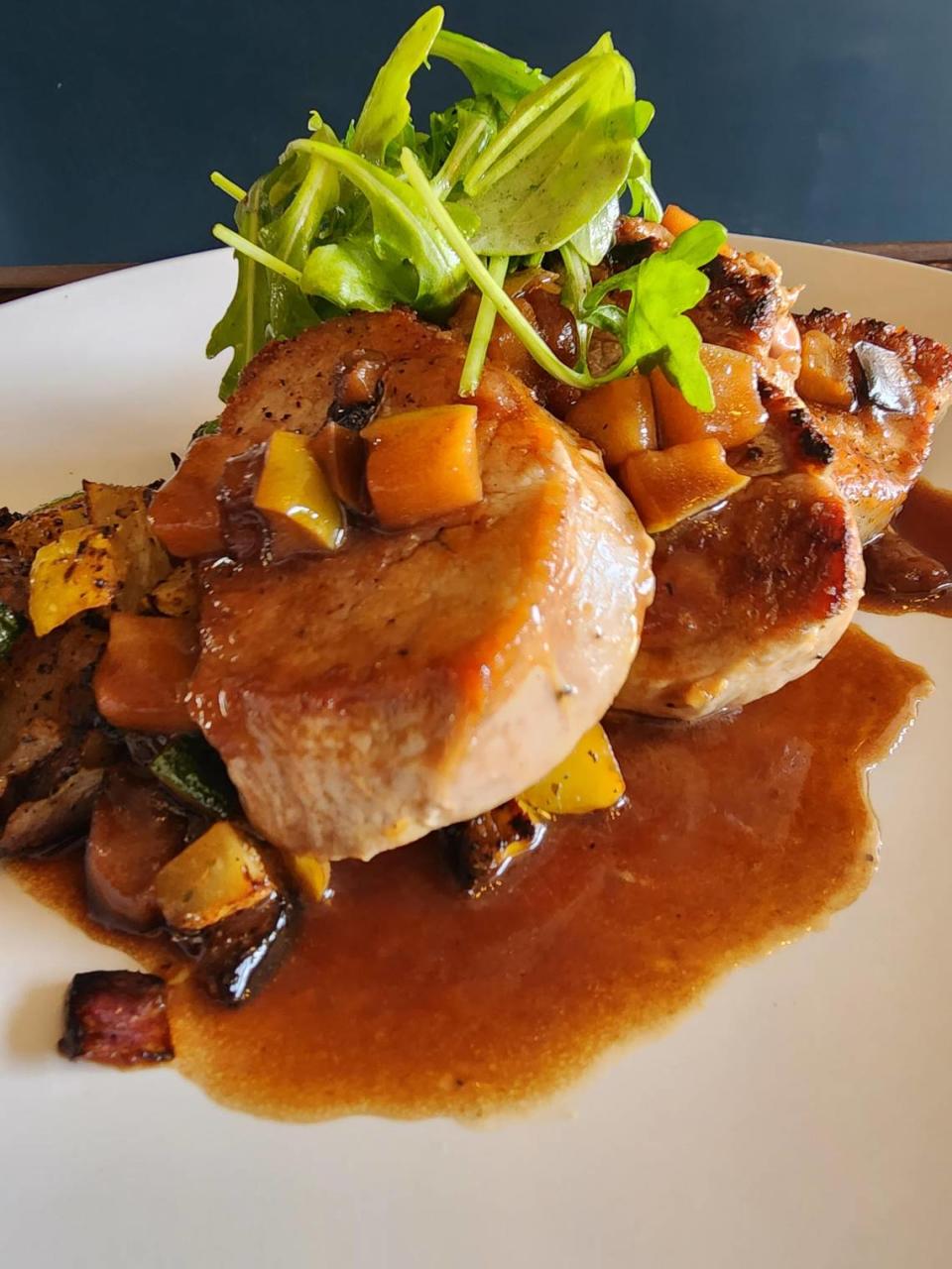 District 7 Social Hall is offering pork tenderloin over roasted vegetable hash, served with garlic mashed potatoes and apple demi-glace as their special entree for Lexington Restaurant Week.