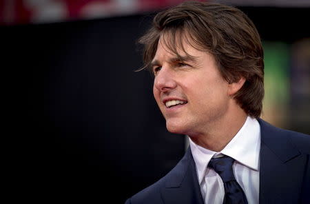 Actor Tom Cruise poses on the red carpet for a screening of the film "Mission Impossible: Rogue Nation" in New York July 27, 2015. REUTERS/Brendan McDermid