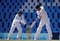 Cricket - New Zealand v South Africa - second cricket test match - Centurion Park, Centurion, South Africa - 29/8/2016. South Africa's wicketkeeper Quinton de Kock makes a catch to dismiss New Zealand's Tim Southee. REUTERS/Siphiwe Sibeko