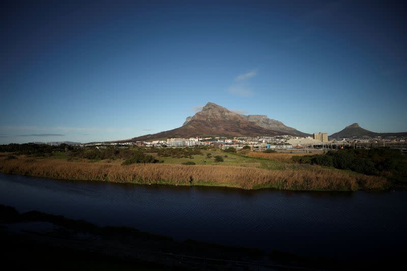 FILE PHOTO: Contested land earmarked for a development which includes a new Africa headquarters for U.S. retail giant Amazon is seen alongside the Black River in Cape Town