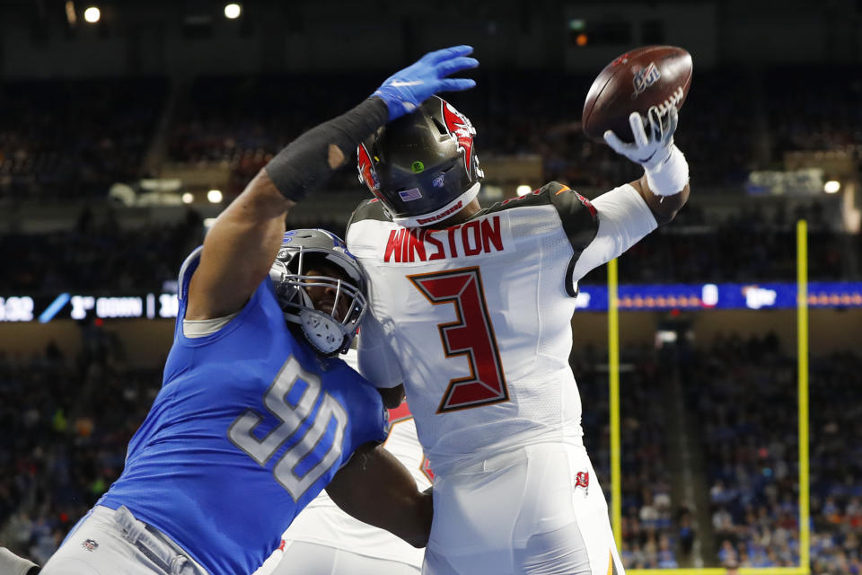 FILE - Tampa Bay Buccaneers quarterback Jameis Winston (3) throws before being hit by Detroit Lions defensive end Trey Flowers (90) during the first half of an NFL football game, Sunday, Dec. 15, 2019, in Detroit. NFL teams can always use more pass rushers, as evidenced by the NFC North where all four teams have spent big to acquire them over the last three years. (AP Photo/Paul Sancya, FIle)