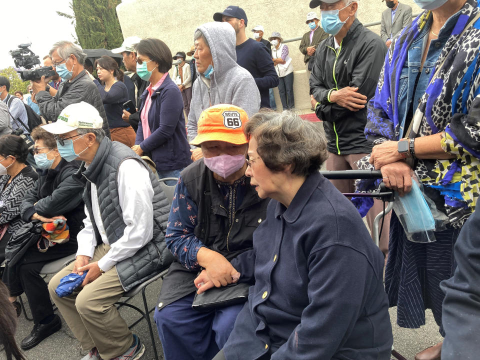 Survivors and church leaders join in prayer and thank community members for their support nearly a week after a deadly shooting at a Taiwanese American church congregation Saturday, May 21, 2022, in Laguna Woods, Calif. The community is reeling after the attack on a luncheon of the Irvine Taiwanese Presbyterian Church that killed one and wounded five. (AP Photo/Amy Taxin)