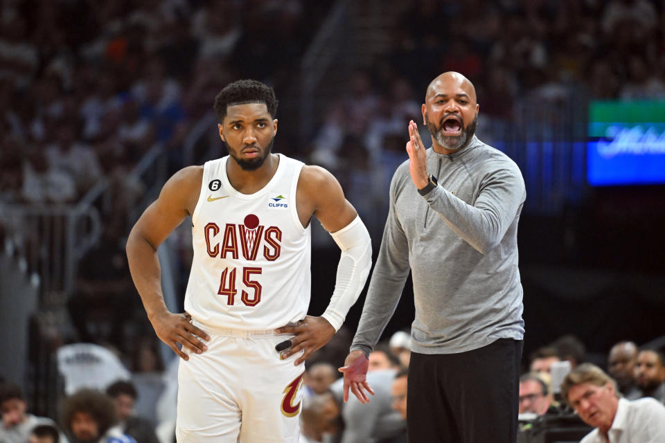 Donovan Mitchell and J.B Bickerstaff of the Cleveland Cavaliers react to a call during the second quarter of Game 1 of the Eastern Conference first-round playoffs against the New York Knicks. (Jason Miller/Getty Images)