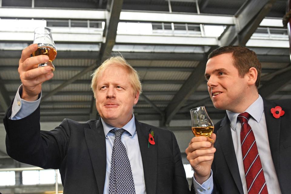 Boris Johnson pictured with Douglas Ross in November last year (PA)