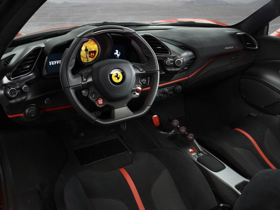 <p>Ever since the debut of the Enzo, Ferrari has used a wheel layout that incorporates the column stalk features into buttons on the wheel, including headlights, wipers, and even turn signals. You can also option multicolor shift lights on the top of the wheel rim, which is cool if you want to pretend you're a race-car driver. </p>