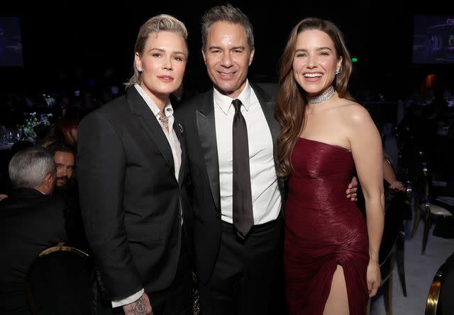 <p>Kevin Mazur/Getty</p> Ashlyn Harris, Eric McCormack and Sophia Bush 32nd Annual Academy Awards Viewing Party on March 10, 2024 in West Hollywood, California