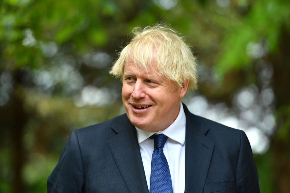 Britain's Prime Minister Boris Johnson attends a national service of remembrance at the National Memorial Arboretum in Alrewas, central England on August 15, 2020, to mark the 75th anniversary of VJ (Victory over Japan) Day. (Photo by Anthony Devlin / POOL / AFP) (Photo by ANTHONY DEVLIN/POOL/AFP via Getty Images)