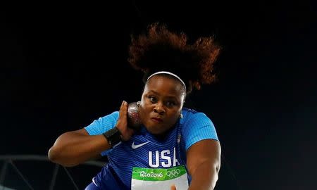 Michelle Carter (USA) of USA competes on her way to the gold medal in the women's shot put. REUTERS/Kai Pfaffenbach