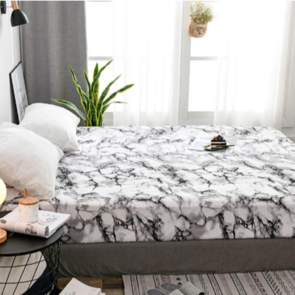 Soft Lightweight Microfiber Marble Printed Bedding Sheet. (PHOTO: Zalora)