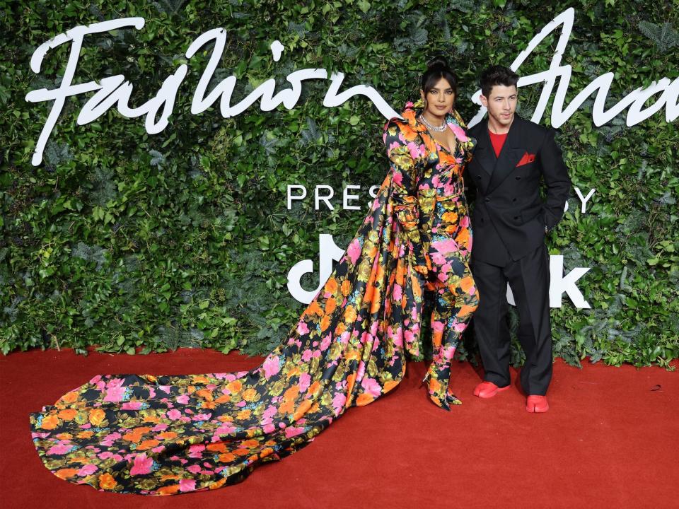 Priyanka Chopra Jonas and Nick Jonas at the Fashion Awards on November 29, 2021.