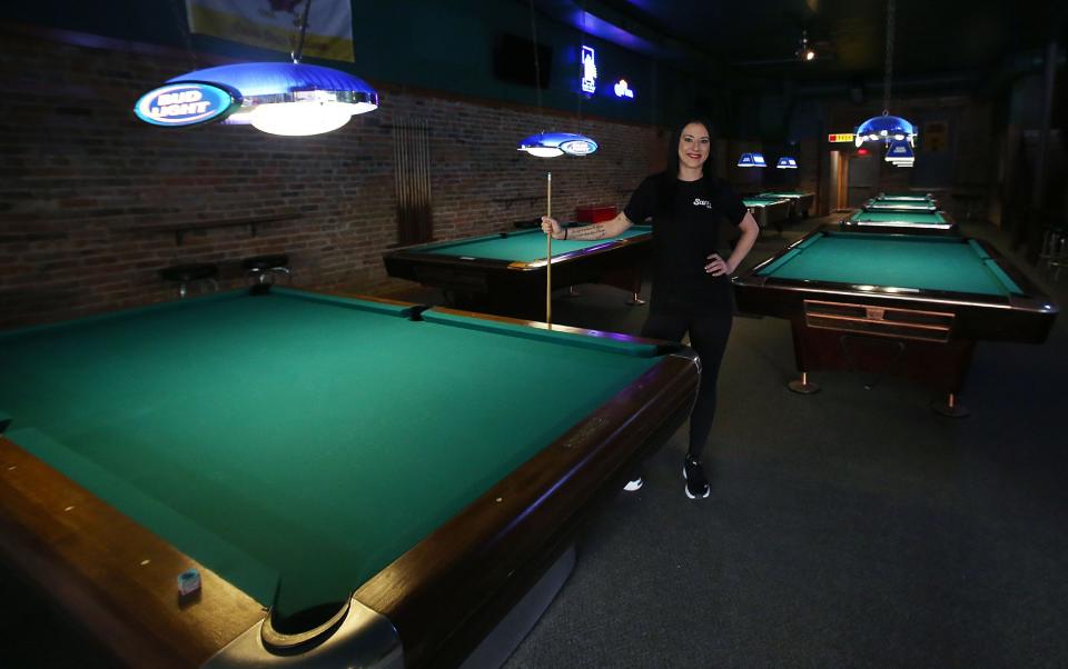 Jessica Fisher, director of operations, shows the newly renovated Sam's Place is ready to open under the new ownership on Main Street, Monday, Nov. 14, 2022, in Ames, Iowa.