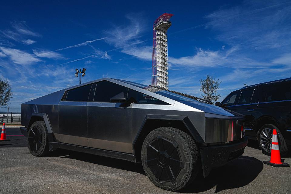 A Tesla Cybertruck is parked outside the 44 Club during the Formula 1 Lenovo United States Grand Prix at Circuit of Americas on Sunday, Oct. 22, 2023.