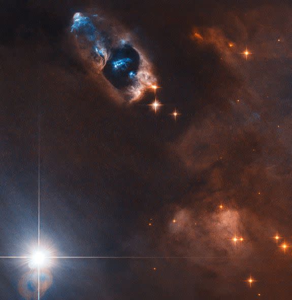 Bright lights inside a nebula.