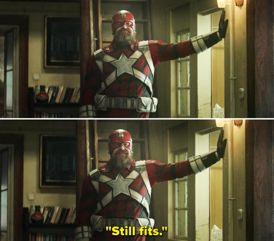 Alexei posing in a door way in his Red Guardian suit and saying, "Still fits"