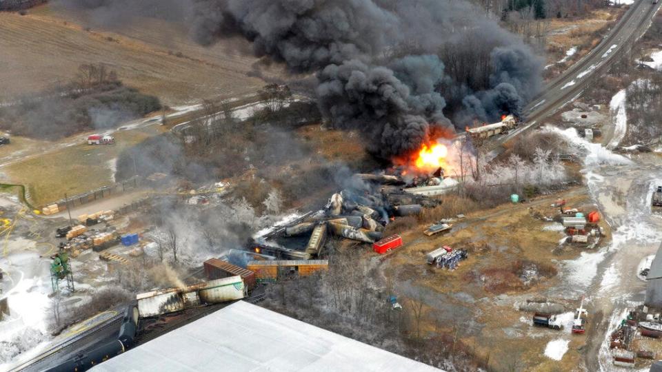 This photo taken with a drone shows portions of a Norfolk Southern freight train that derailed on Feb. 3 in East Palestine, Ohio, still on fire at mid-day Saturday, Feb. 4.