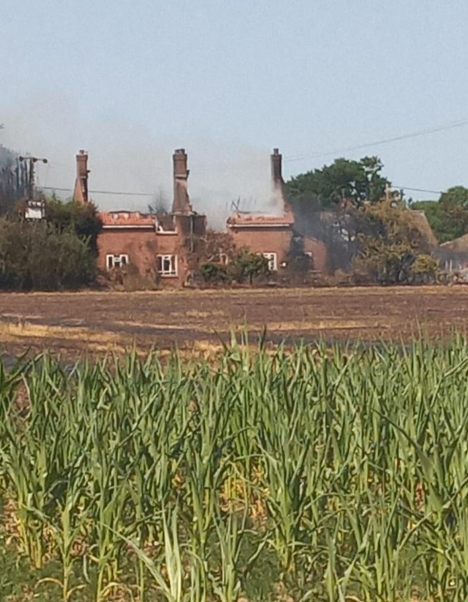 Smoke seen rising from the Calver’s house across a field (Jason Calver)