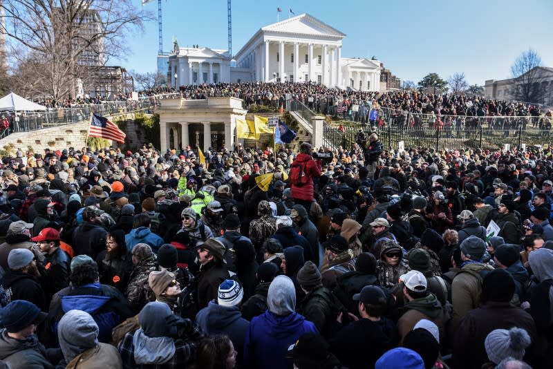 A large crowd gathers on a Gun Lobby Day in front of the Virginia State Capitol building in Richmond