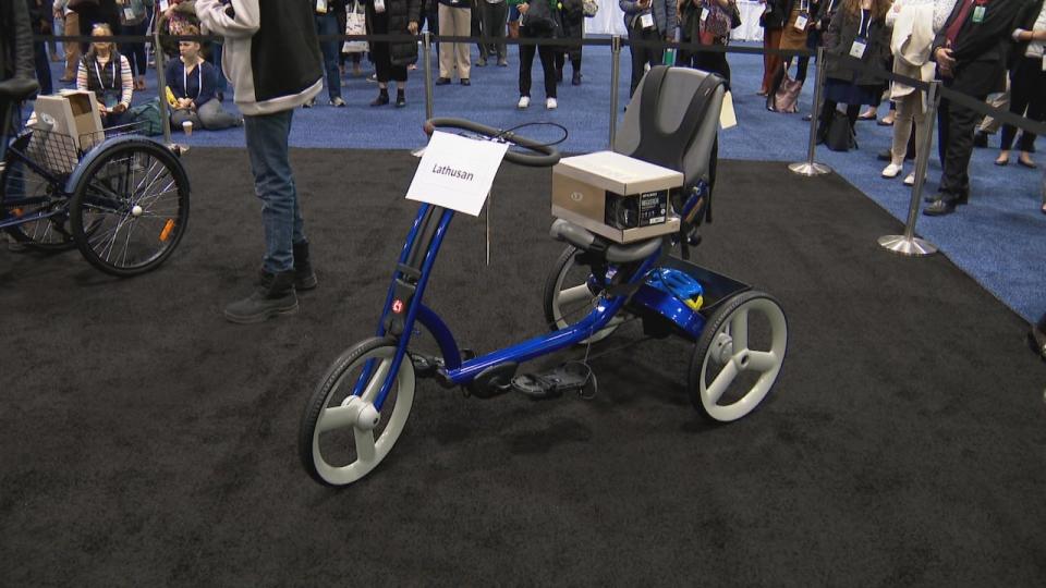 An adapted bike, complete with a personalized helmet, waits for its new owner.