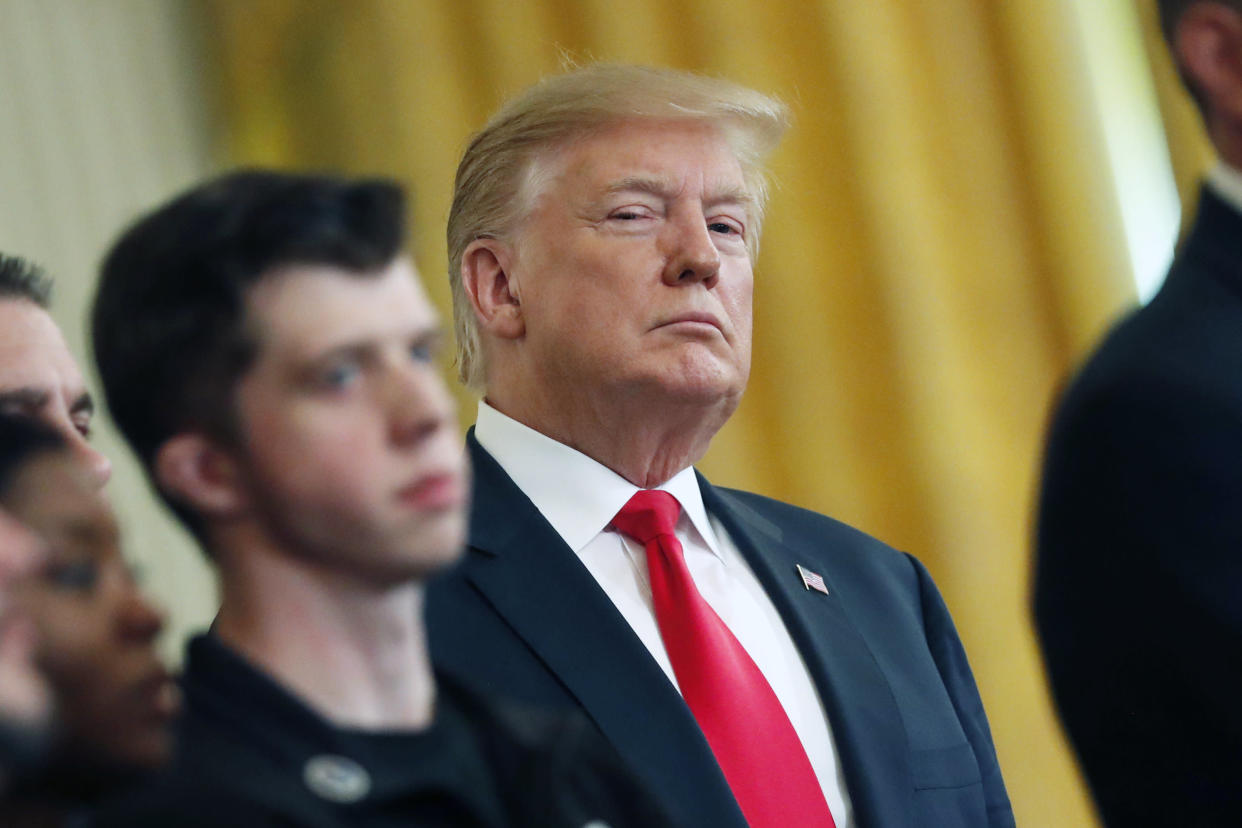 President Donald Trump stands during a Wounded Warrior Project Soldier Ride event in the East Room of the White House, Thursday, April 18, 2019, in Washington. (AP Photo/Pablo Martinez Monsivais)