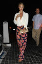 <p>The supermodel and actress was seen out and about in Los Angeles embodying Katharine Hepburn chic in a classic white blouse and loose floral print trousers.<br><br></p>