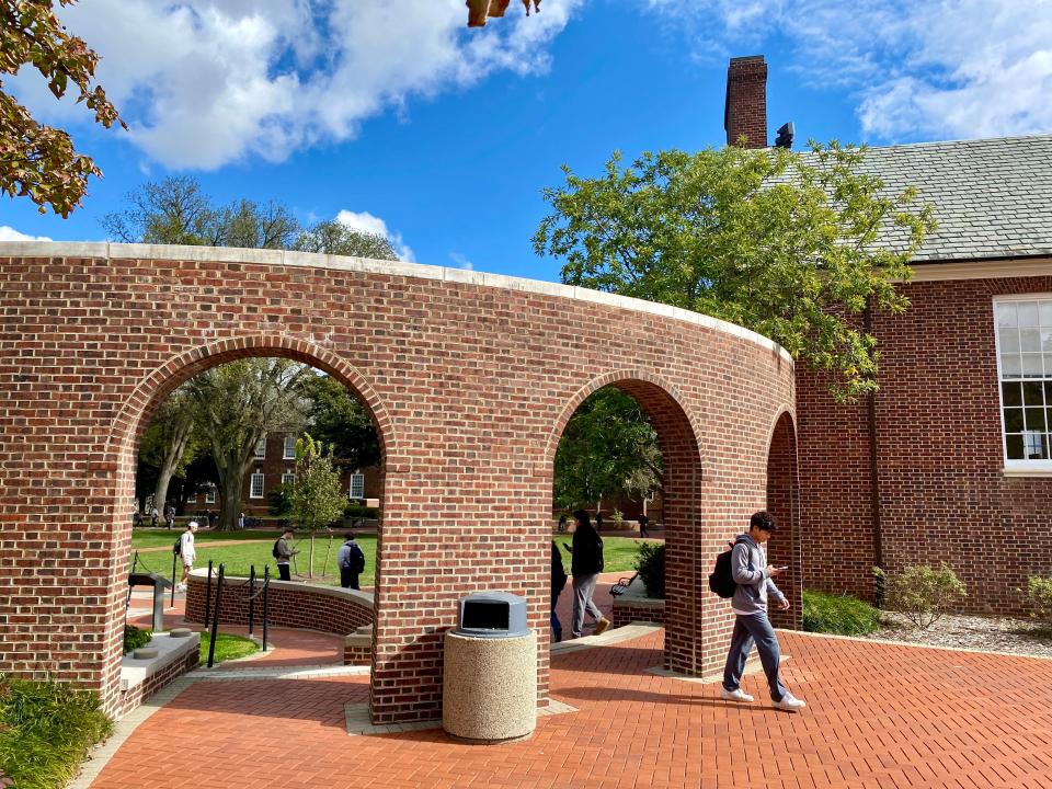 The brick triple archway at University of Delaware's Memorial Hall, known to some as the "Kissing Arches."