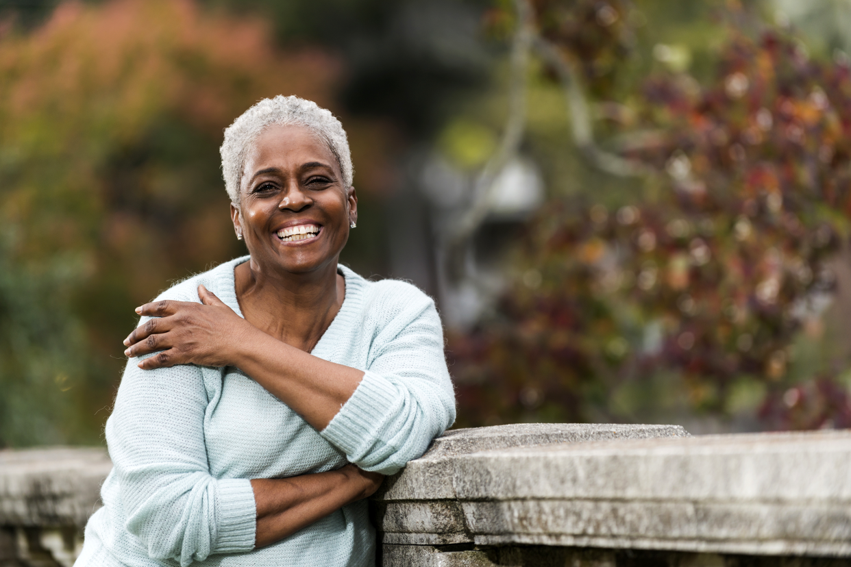 Smiling senior woman outside