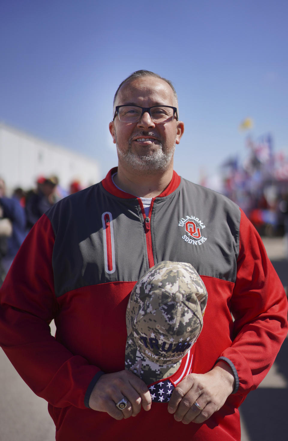 Philip Hinson stands for a portrait while in line at Donald Trump's campaign rally in Vandalia, Ohio, on Saturday, March 16, 2024. (AP Photo/Jessie Wardarski)