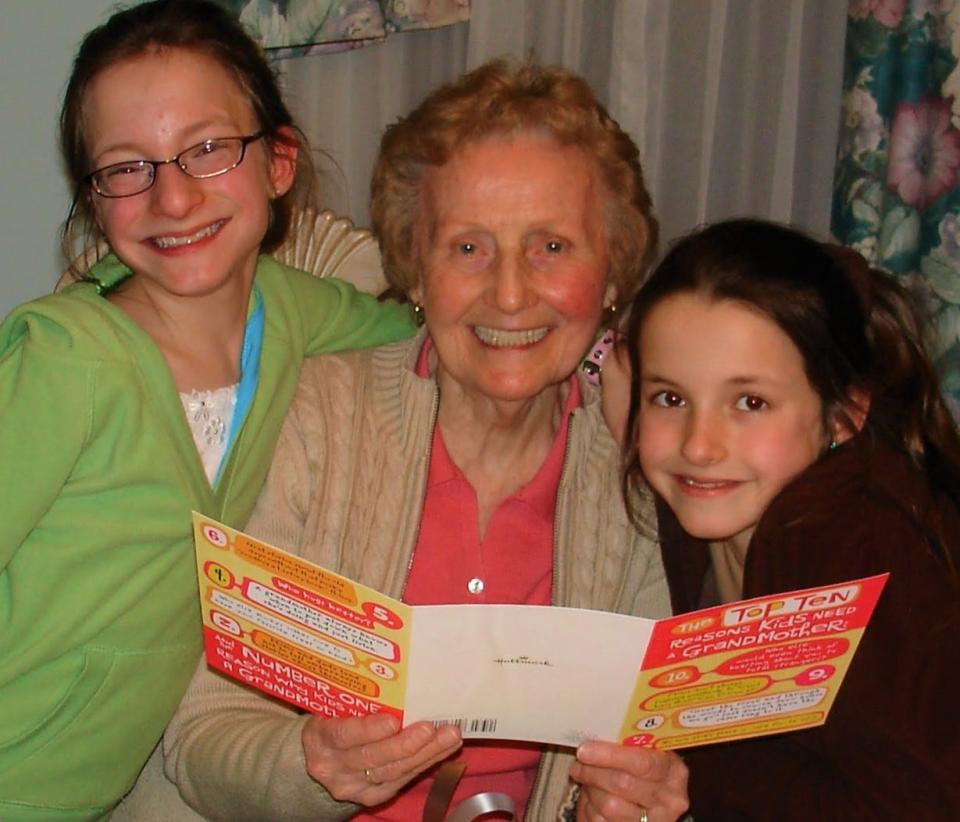 Mary Montminy at her 85th birthday party in Quincy in 2007 with her twin granddaughters Julie, left, and Jackie Montminy.