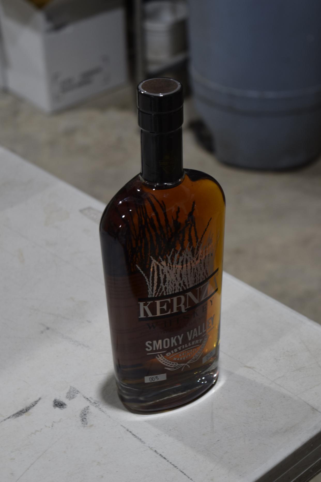 A bottle of Smoky Valley's Kernza wheat whiskey sits in the bottling room at the distillery's 105 N. Washington St. location in downtown Marquette. The whiskey uses Kernza wheat, a perennial grain, that comes from Moundridge.