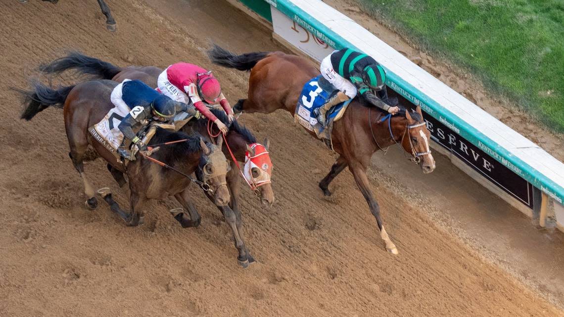 Mystik Dan, right with Brian Hernandez Jr. up, wins the 150th Kentucky Derby.