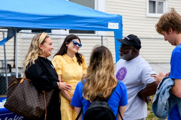 Stevens chats with Pontiac City Councilman William Parker Jr. at the New Springfield Missionary Baptist Church in Pontiac, where Parker is the pastor, on July 23. (Photo: Brittany Greeson for HuffPost)