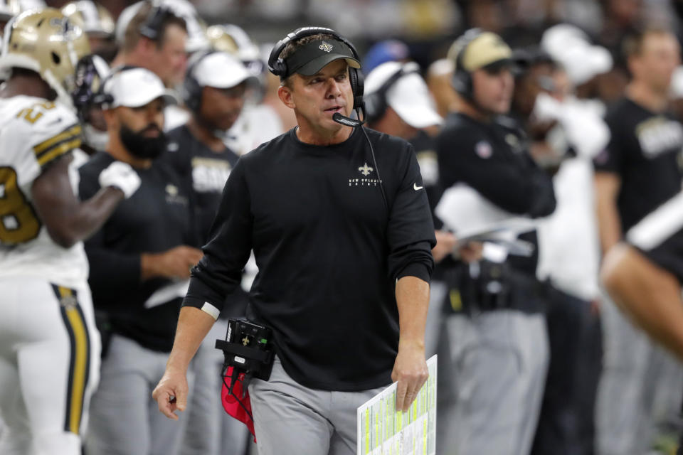 New Orleans Saints head coach Sean Payton walks on the sideline in the first half of an NFL football game against the Dallas Cowboys in New Orleans, Sunday, Sept. 29, 2019. (AP Photo/Bill Feig)
