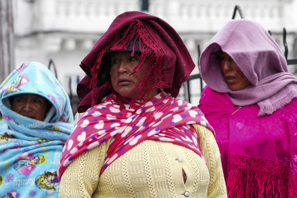 Indigenous women march in a light rain against the country’s insecurity, and are asking for the respect of Indigenous justice, in Latacunga, Ecuador, Friday, Feb. 9, 2024. (AP Photo/Dolores Ochoa)