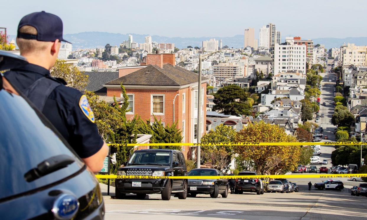 <span>Police outside the home of Nancy Pelosi after her husband, Paul, was attacked in San Francisco, California, on 28 October 2022.</span><span>Photograph: Arthur Dong/EPA</span>