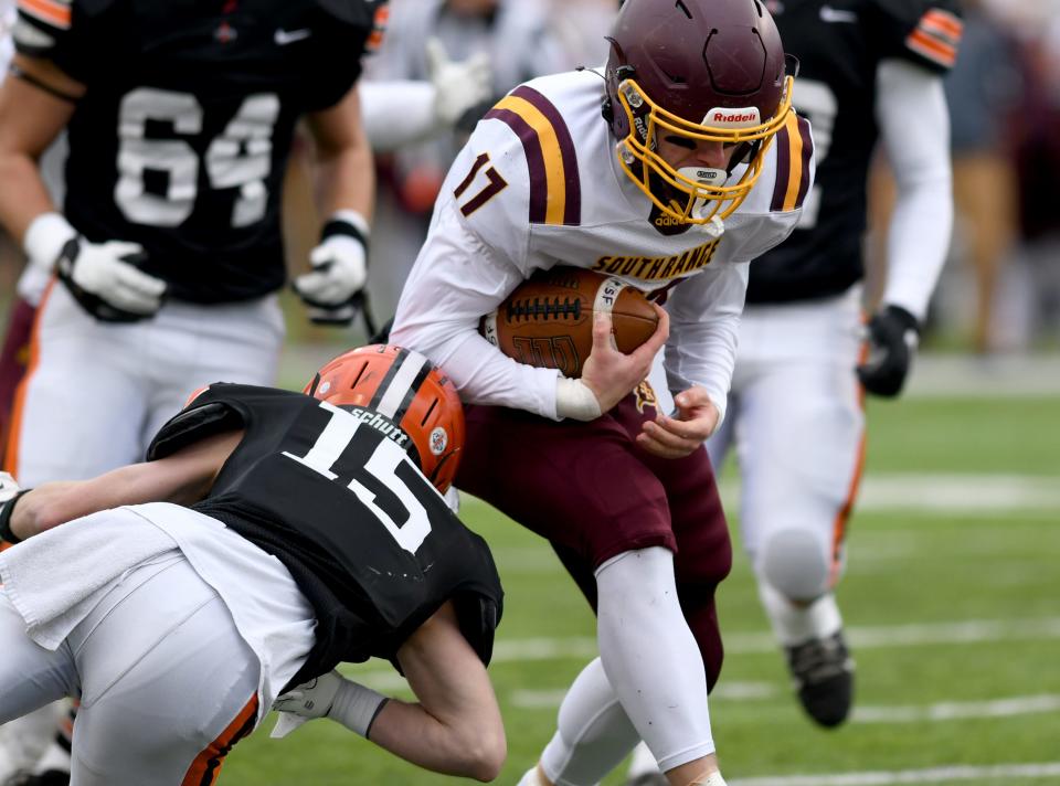 South Range's  Billy Skripac slips in for a touchdown pas Ironton's Landen Wilson in the first quarter of the OHSAA Division V State Championship football game at Tom Benson Hall of Fame Stadium.  Friday, December 02, 2022.